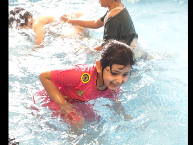 A small child at the summer camp, from the post.